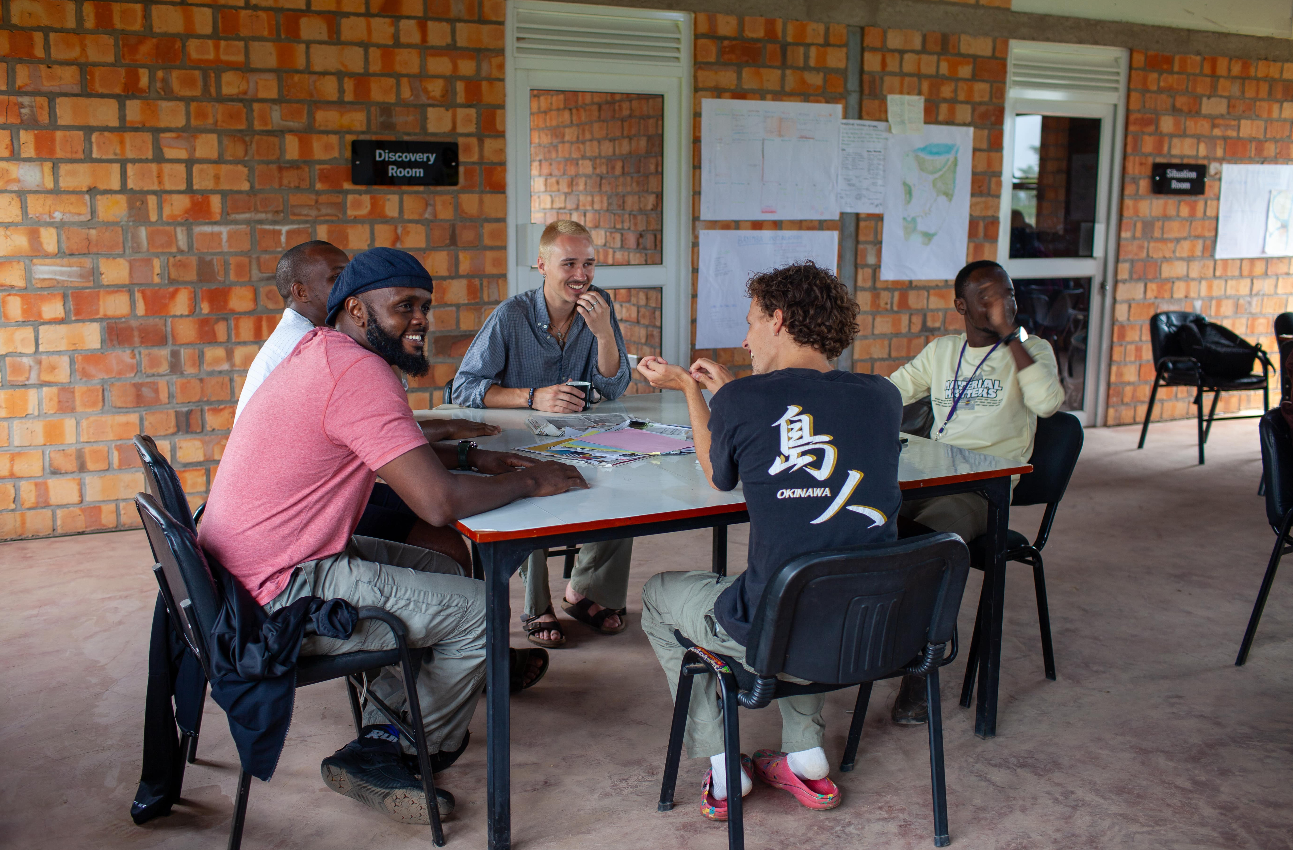 Collaboration and camaraderie are evident as participants share a lighthearted moment in the Discovery Room.