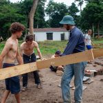 On-site at Lukunlu Island, the team begins the hard work of constructing the main pavilion, starting with the heavy wooden beams